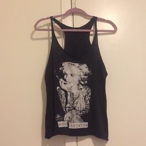 Hess Clothing tank. Runs size smaller than sized.